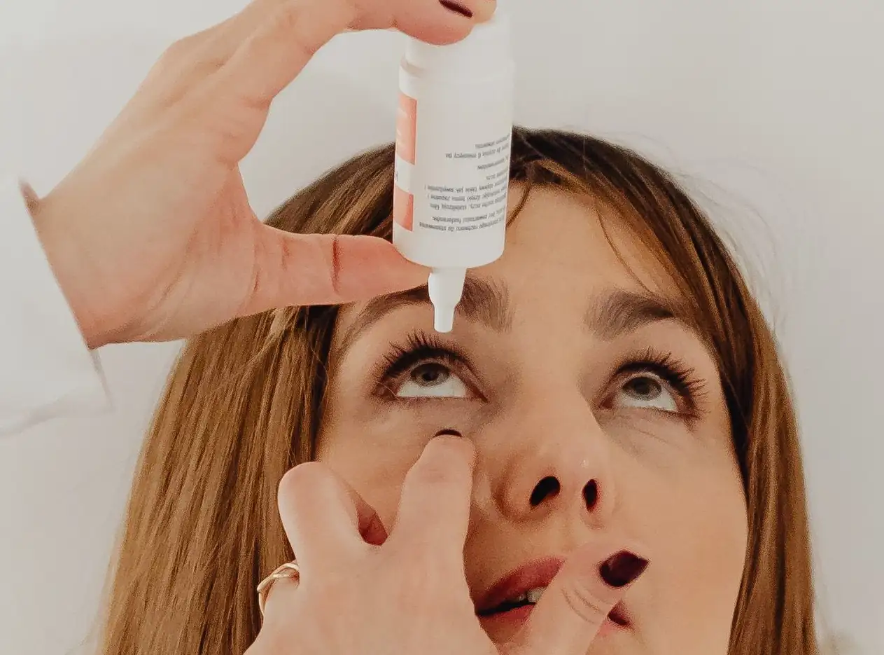 Eye drops being applied, representing short-lived dry-eye relief